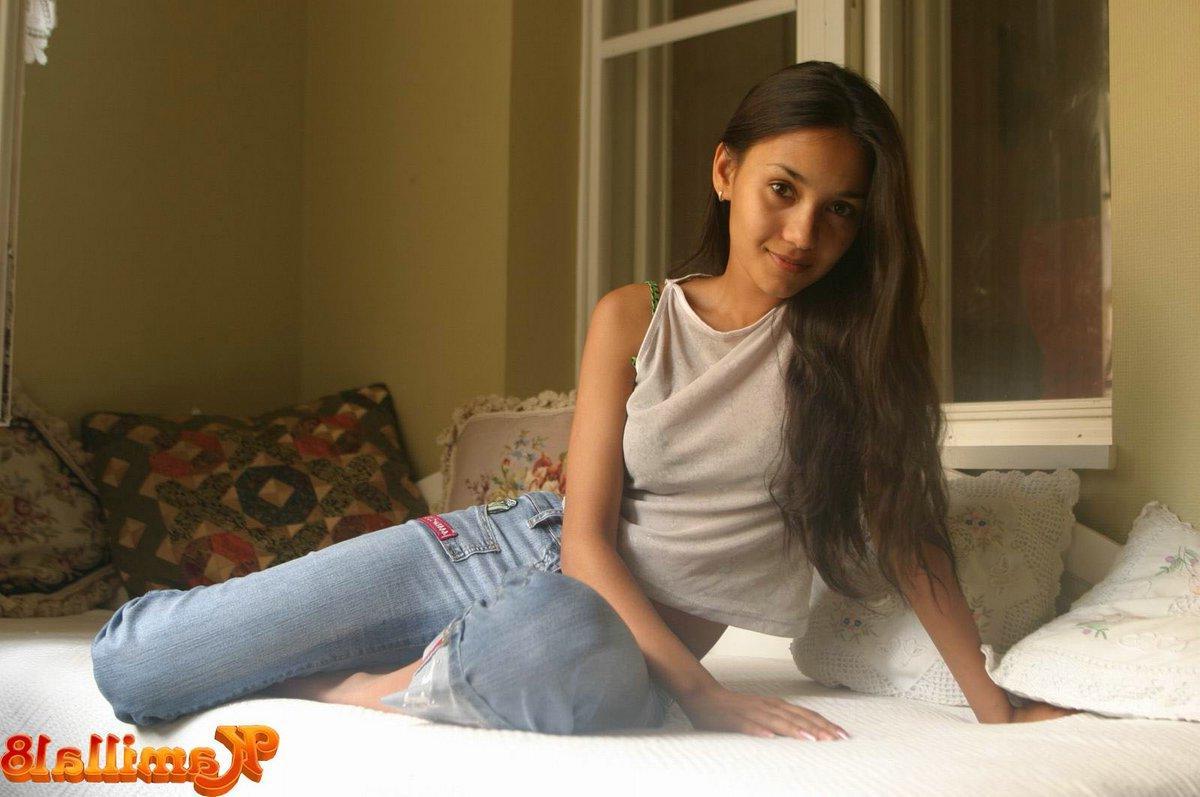 15P Kamilla taking off her jeans on bed