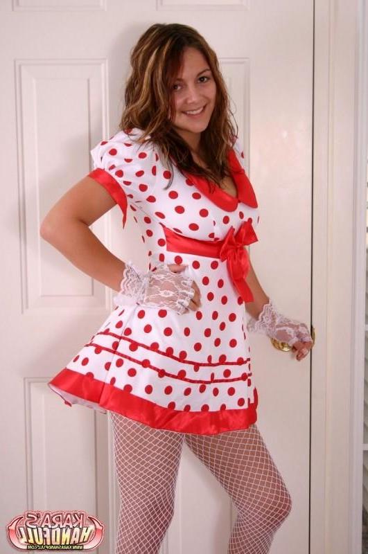 15P Kara in a polkadot dress with white socks and stockings