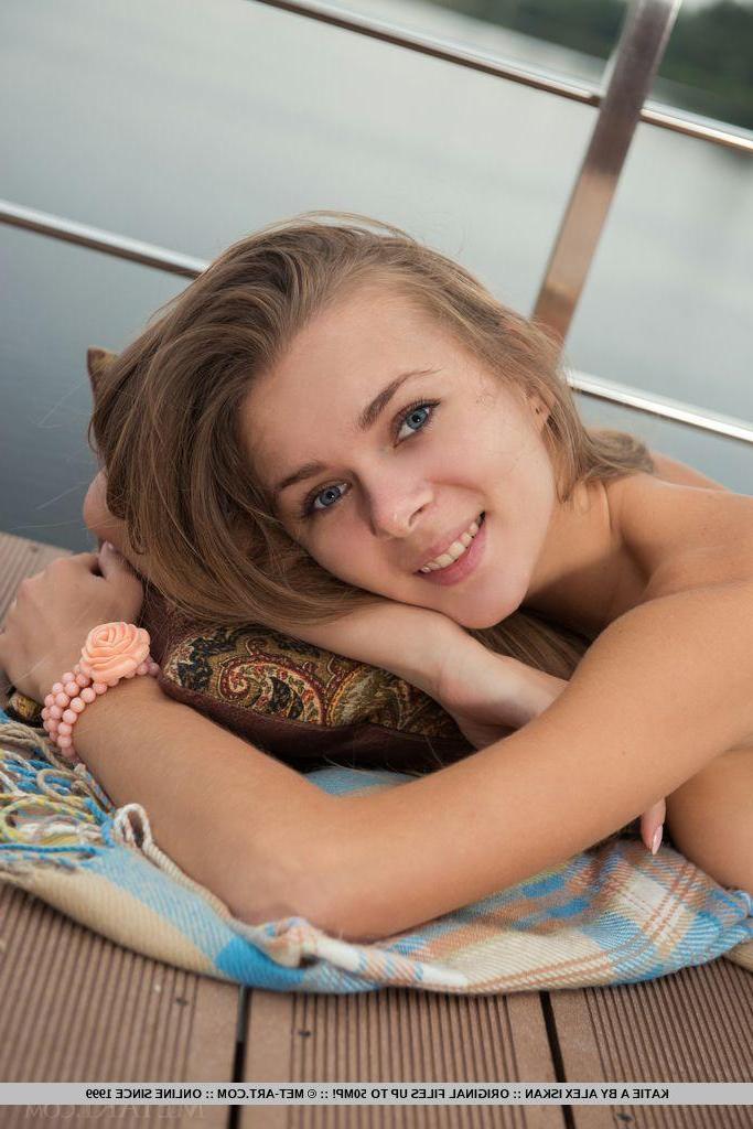 18P Stunning girl Katie A strips naked on a boat