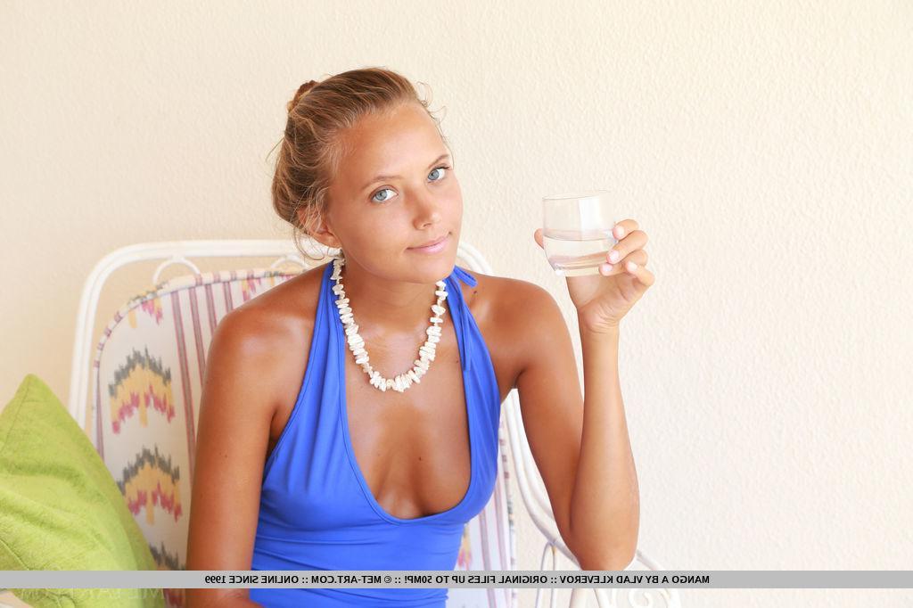 18P Mango A enjoys showing off her gorgeous body as she strips just for you