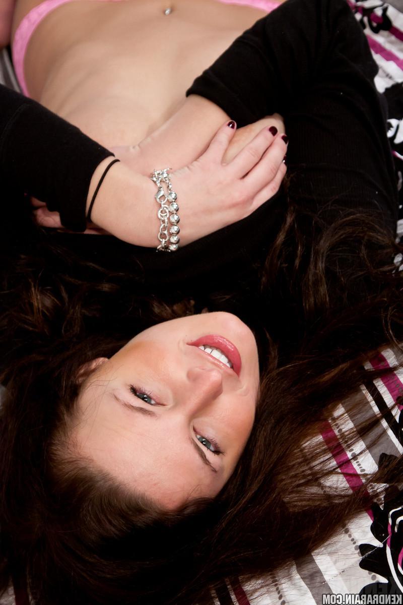 16P Hot girl Kendra Rain strips down to her pink thong and waits for you in bed