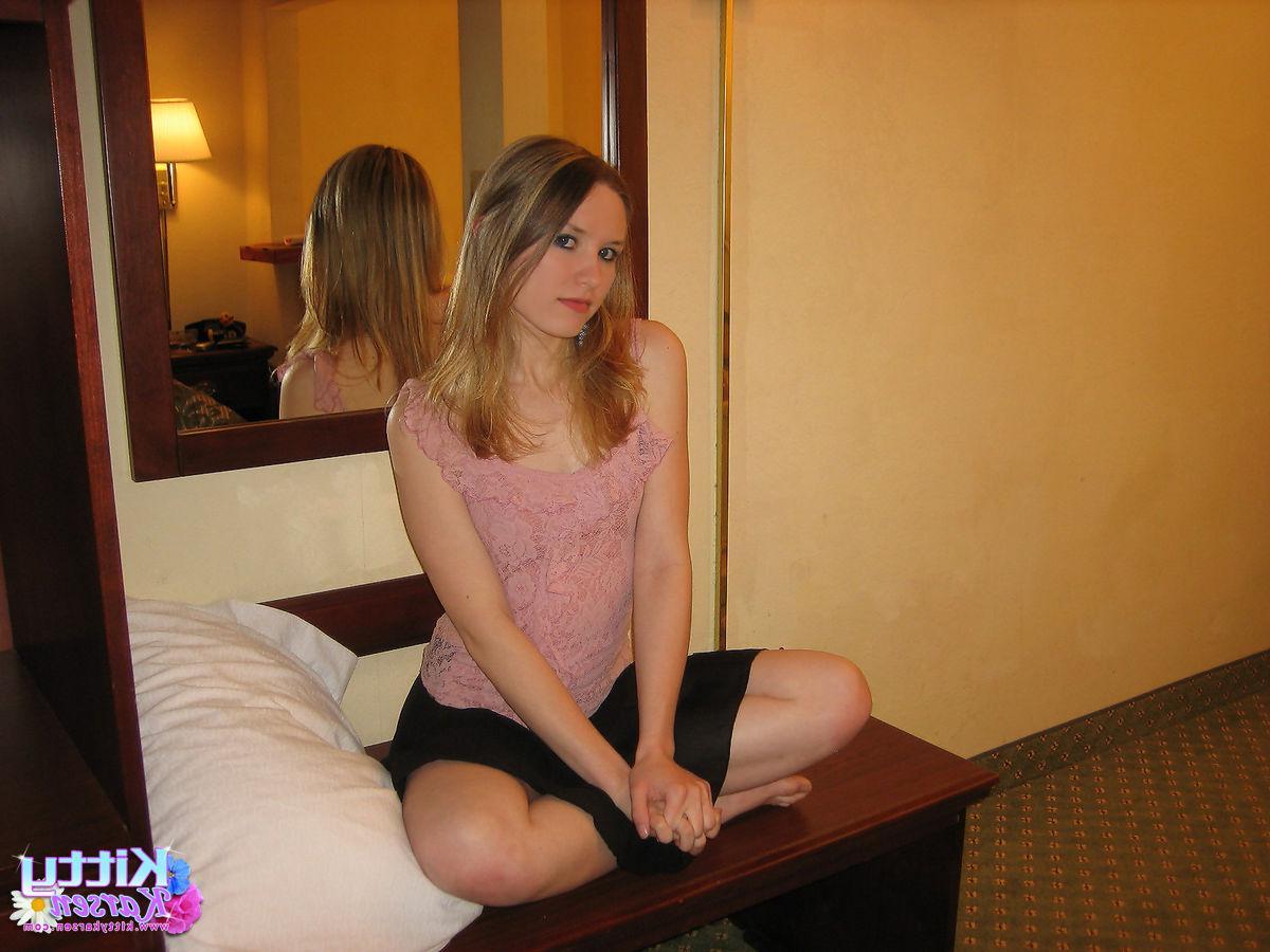 16P Pictures of teen babe Kitty Karsen playing with her nude body