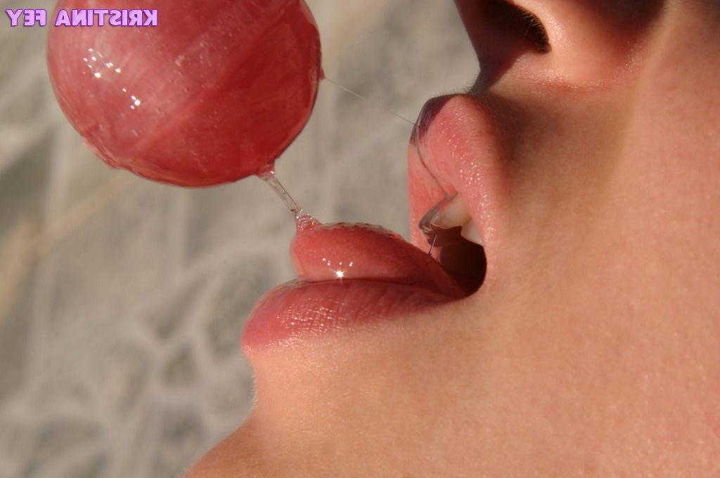 15P Pics of teen babe Kristina Fey doing naughty things to a lollipop