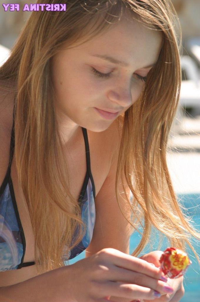 15P Pics of teen cutie Kristina Fey teasing with her hot mouth