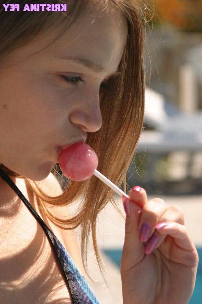 15P Pics of teen cutie Kristina Fey teasing with her hot mouth