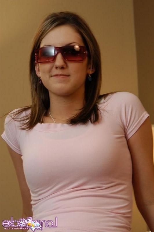 18P Cute brunette posing on her bed