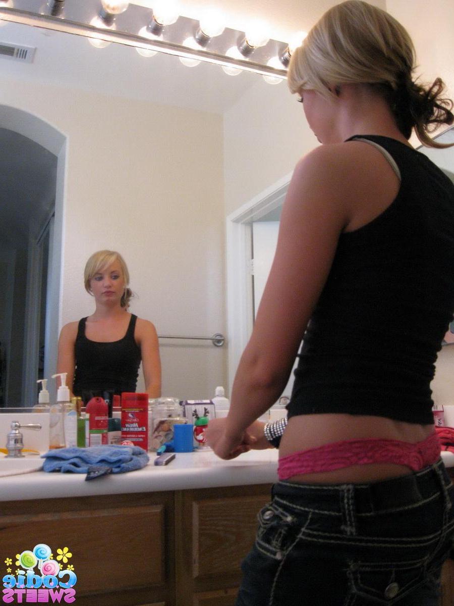 12P Cute blonde teen Codie Sweets shows off her perfect ass in tight jeans as she gets ready to shoot