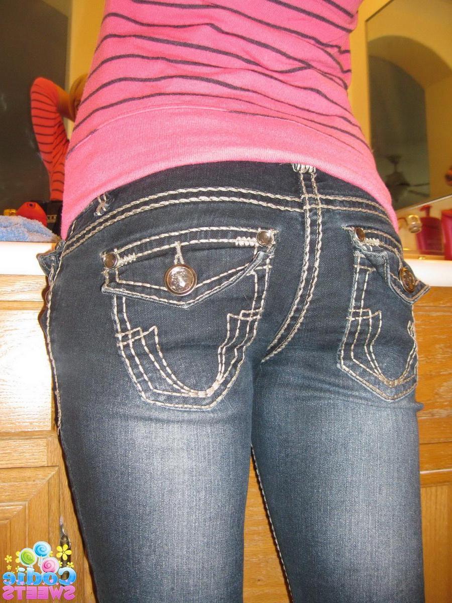 12P Cute blonde teen Codie Sweets shows off her perfect ass in tight jeans as she gets ready to shoot