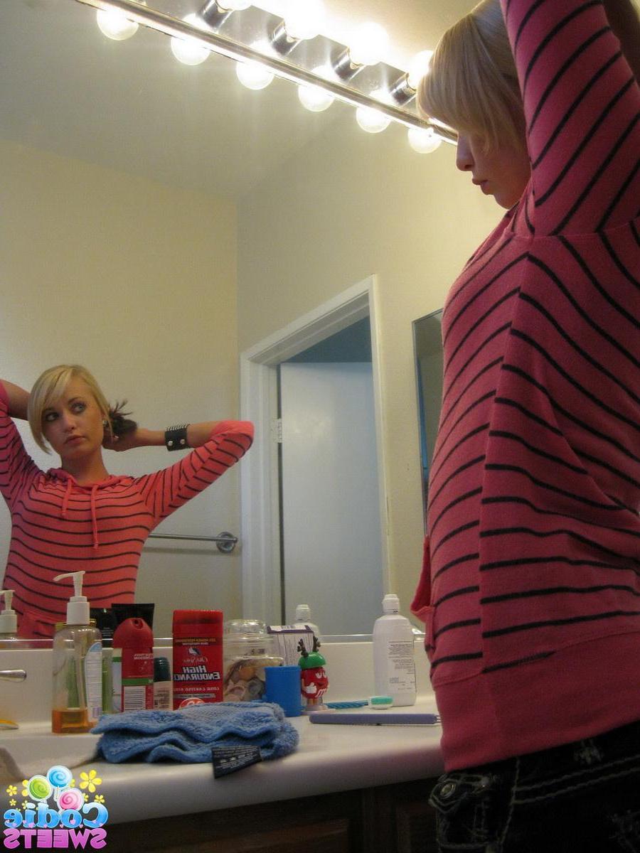 12P Cute blonde teen Codie Sweets shows off her perfect ass in tight jeans as she gets ready to shoot
