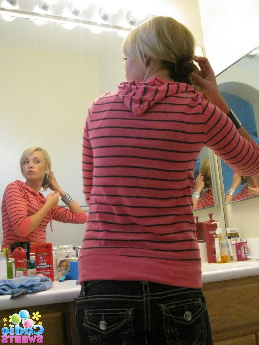 12P Cute blonde teen Codie Sweets shows off her perfect ass in tight jeans as she gets ready to shoot
