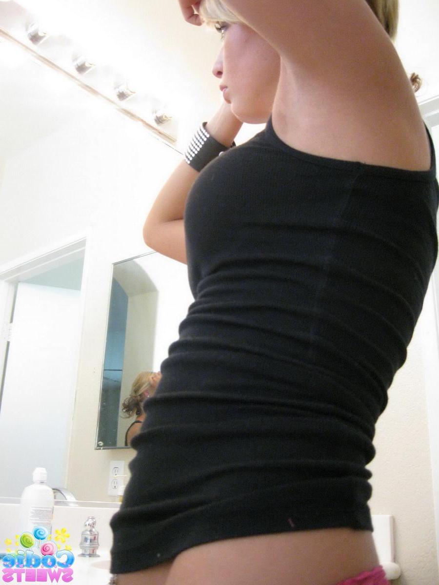 12P Cute blonde teen Codie Sweets shows off her perfect ass in tight jeans as she gets ready to shoot
