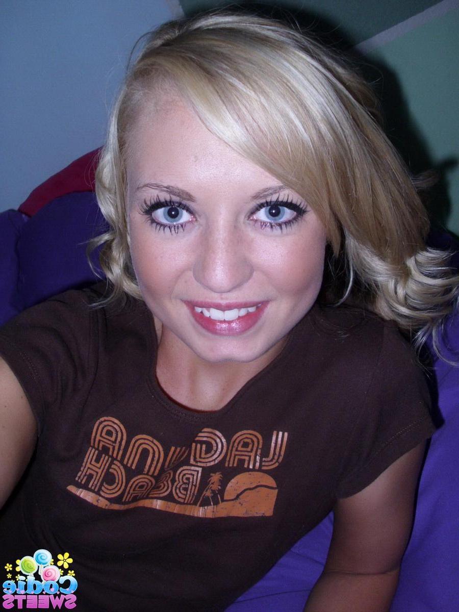 12P Super cute blonde Codie Sweets takes selfshot pictures of her tight pink pussy