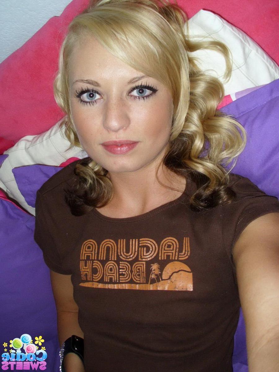 12P Super cute blonde Codie Sweets takes selfshot pictures of her tight pink pussy