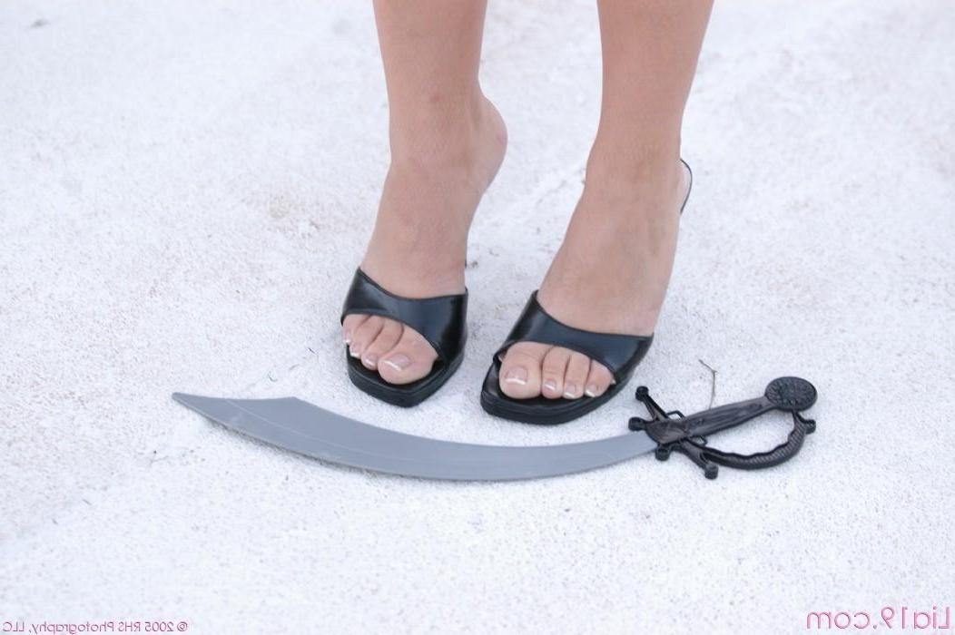 13P Pics of Lia 19 having a sexy sword fight