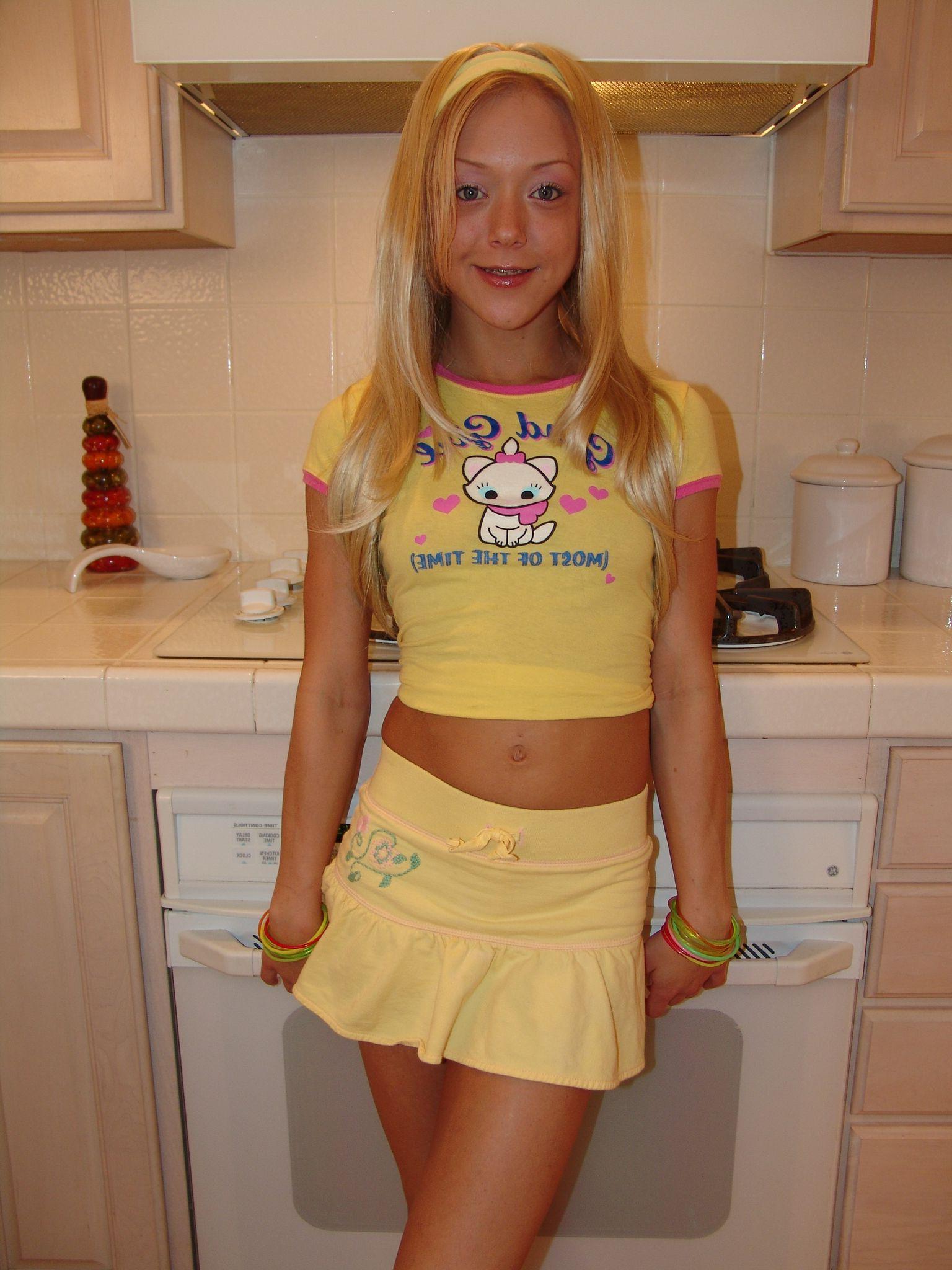 12P Pictures of teen Little Lexie being naughty with her body