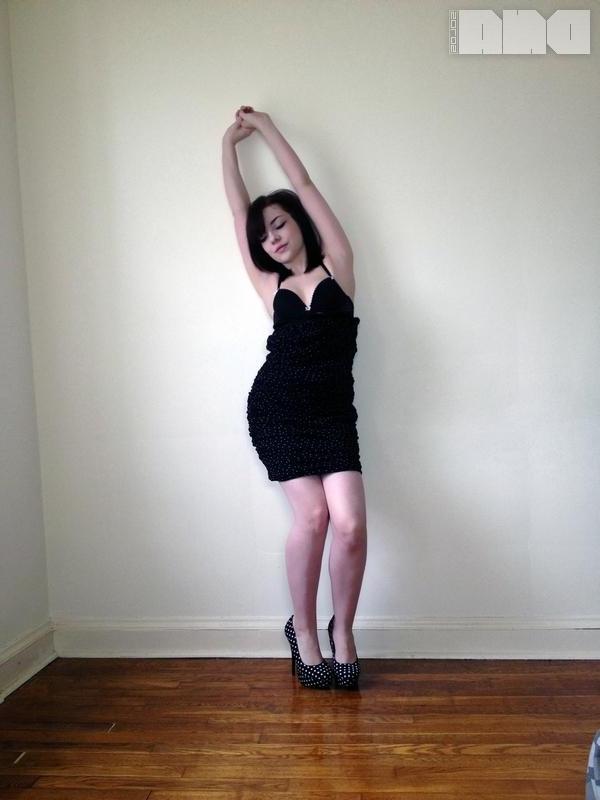15P Sexy pinup Lilly Rose poses her hot body by the wall