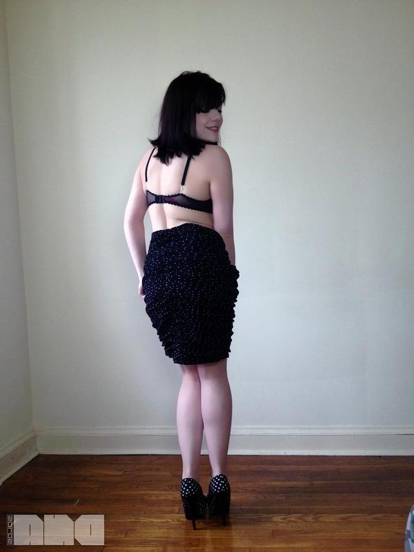 15P Sexy pinup Lilly Rose poses her hot body by the wall