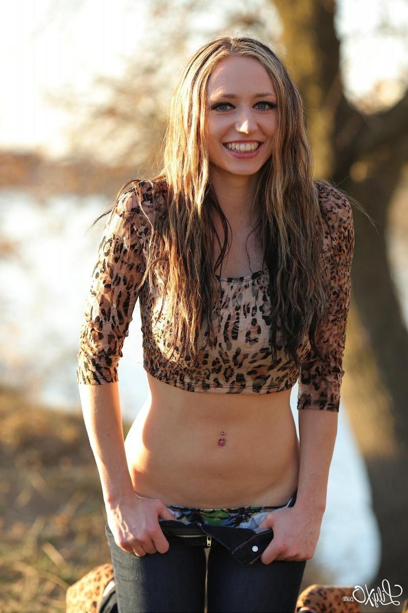 15P Beautiful girl Lily Xo flashes her sexy ass and thong outside