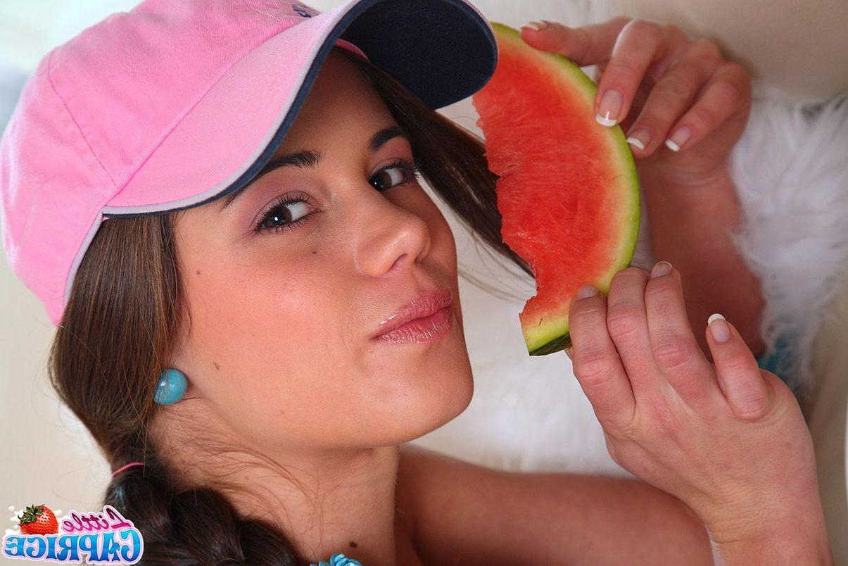 15P Pictures of Little Caprice serving something sweet