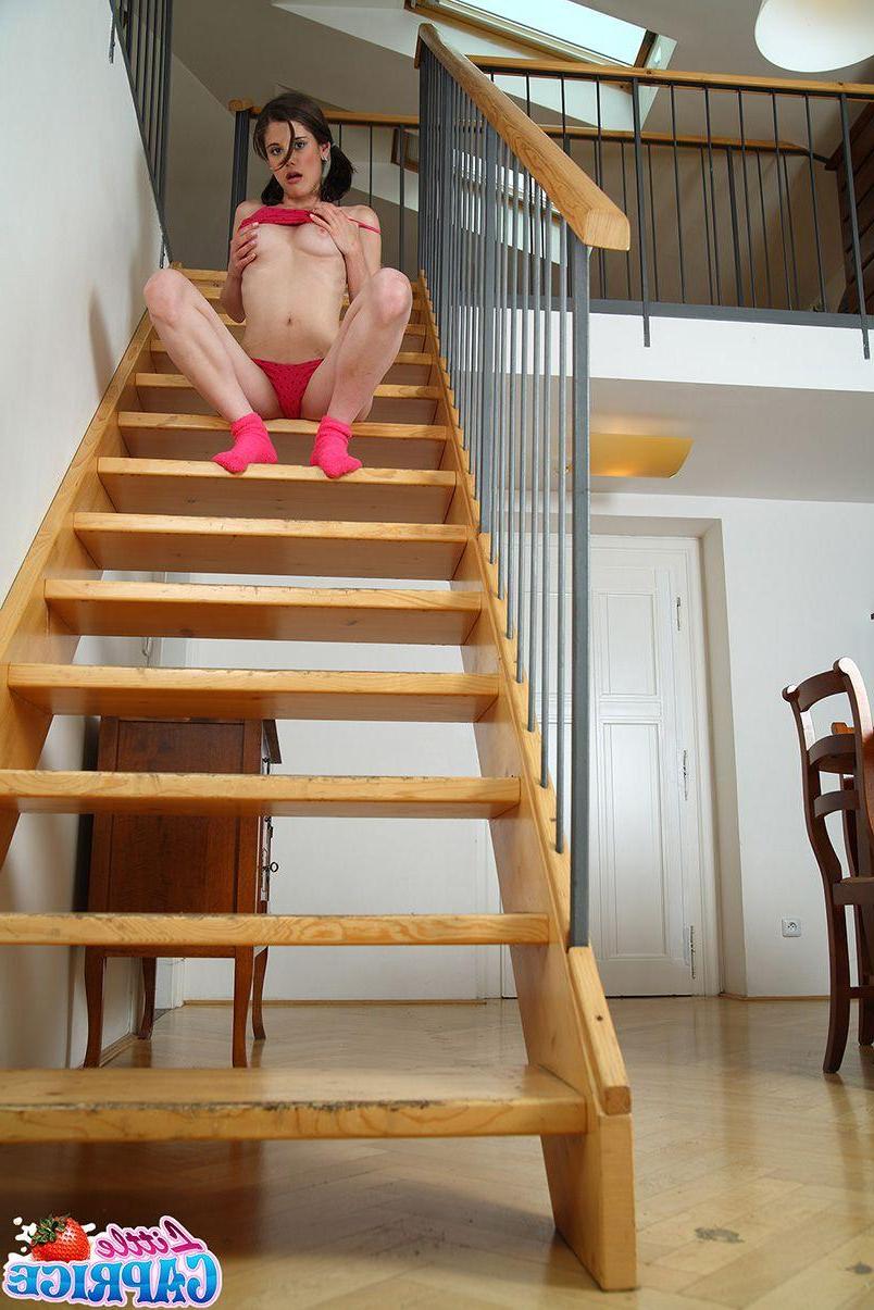15P Pictures of Little Caprice fucking herself on the stairs