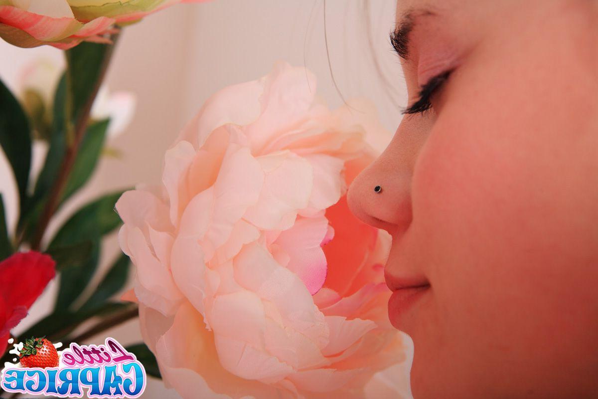 12P Pictures of teen Little Caprice showing you her flower