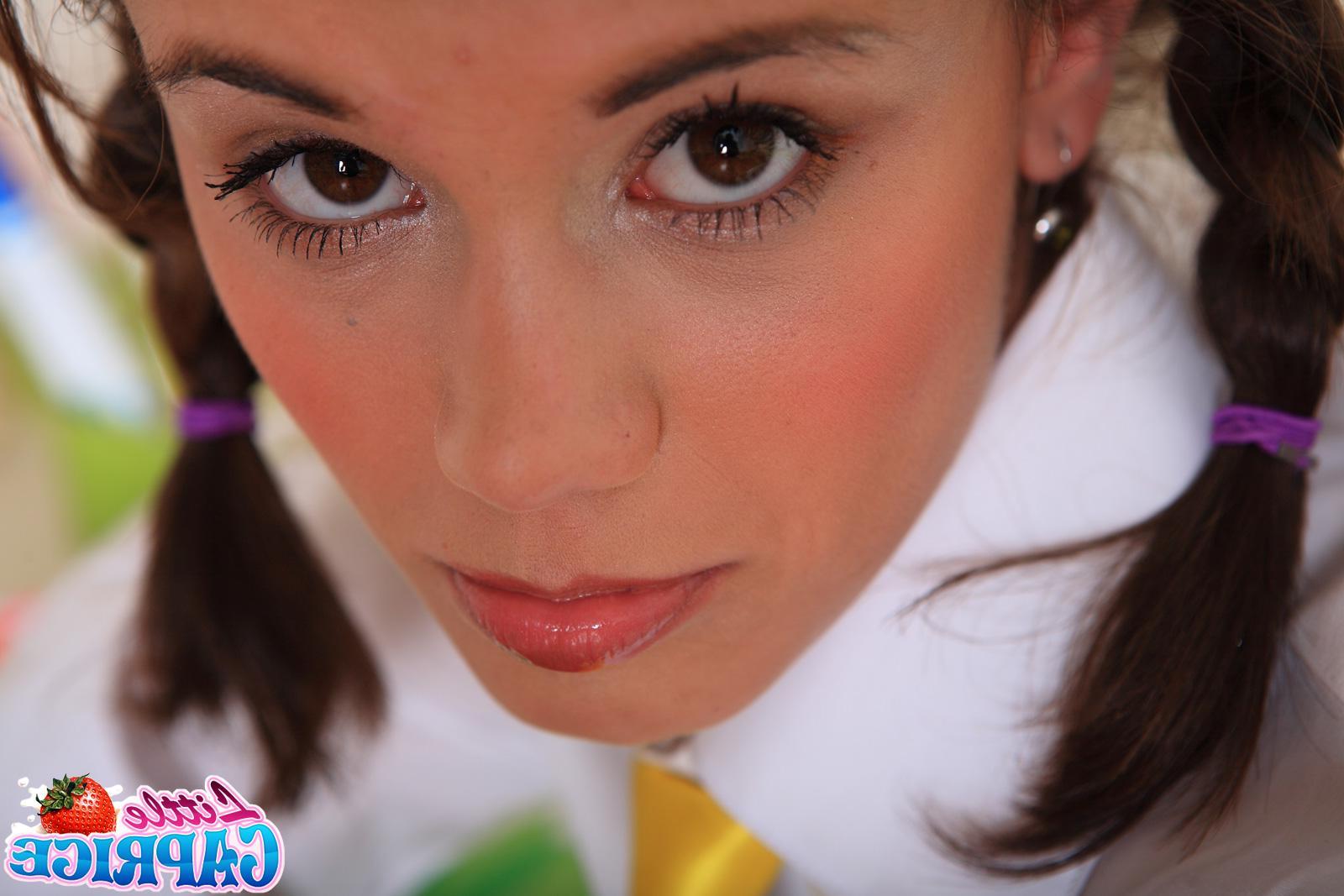 20P Pictures of Little Caprice being a naughty schoolgirl