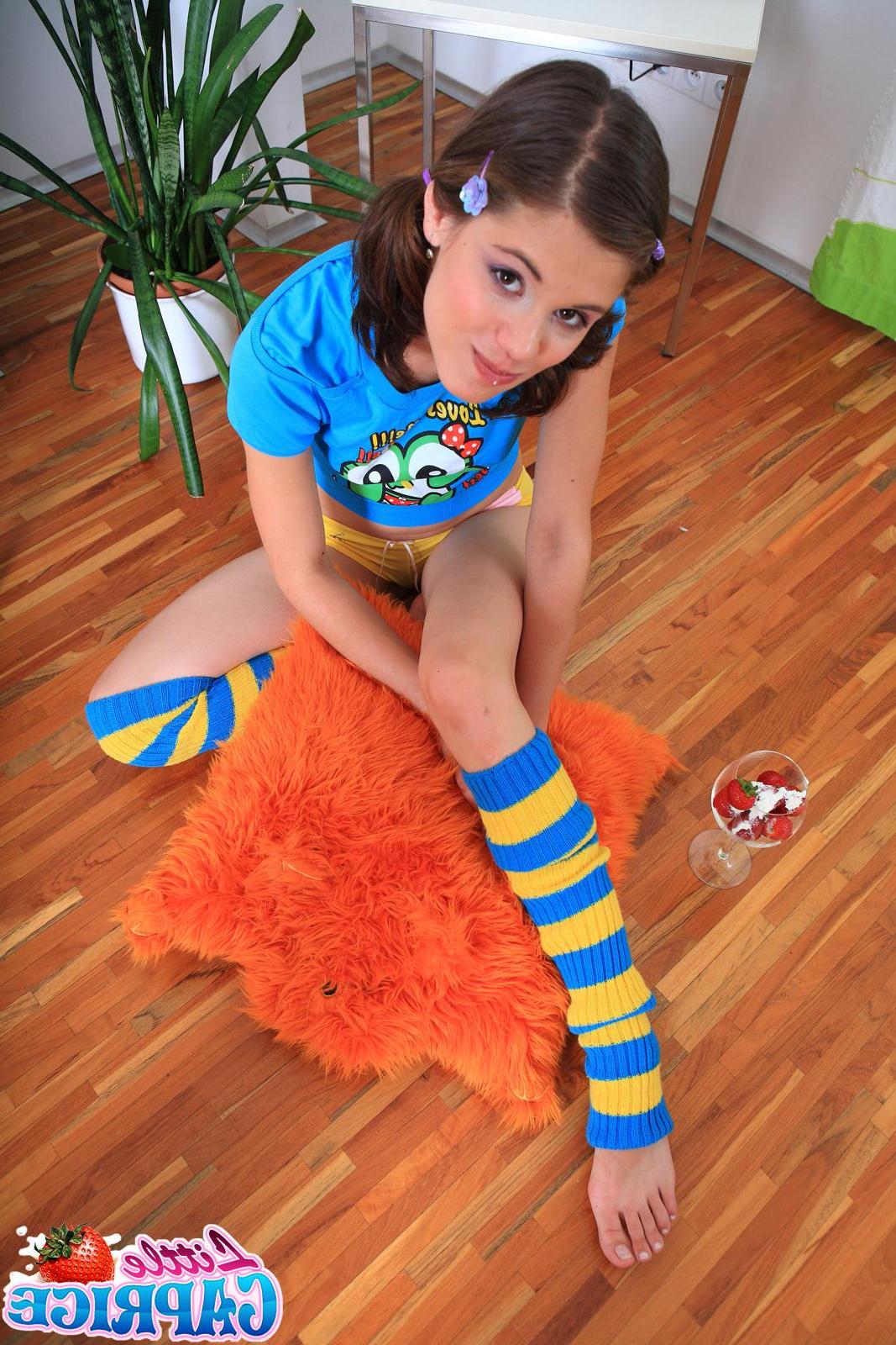 20P Pictures of Little Caprice wearing pigtails and leg warmers