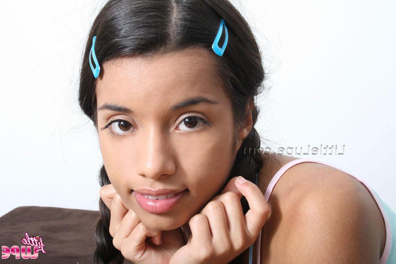 12P Hot latina girl Lupe offers herself up in pigtails and panties