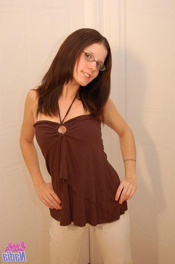 15P Pictures of teen hottie Little Nadia getting naked just for you