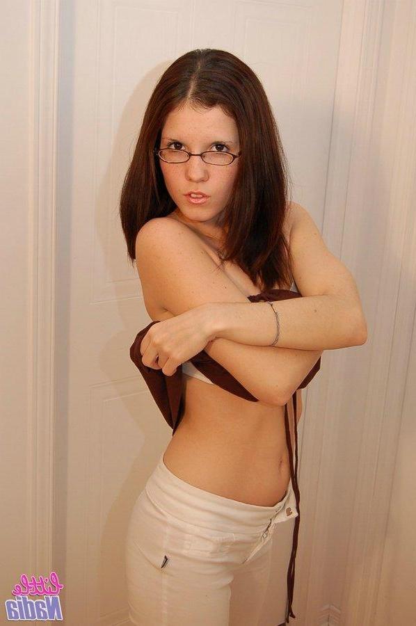 15P Pictures of teen hottie Little Nadia getting naked just for you