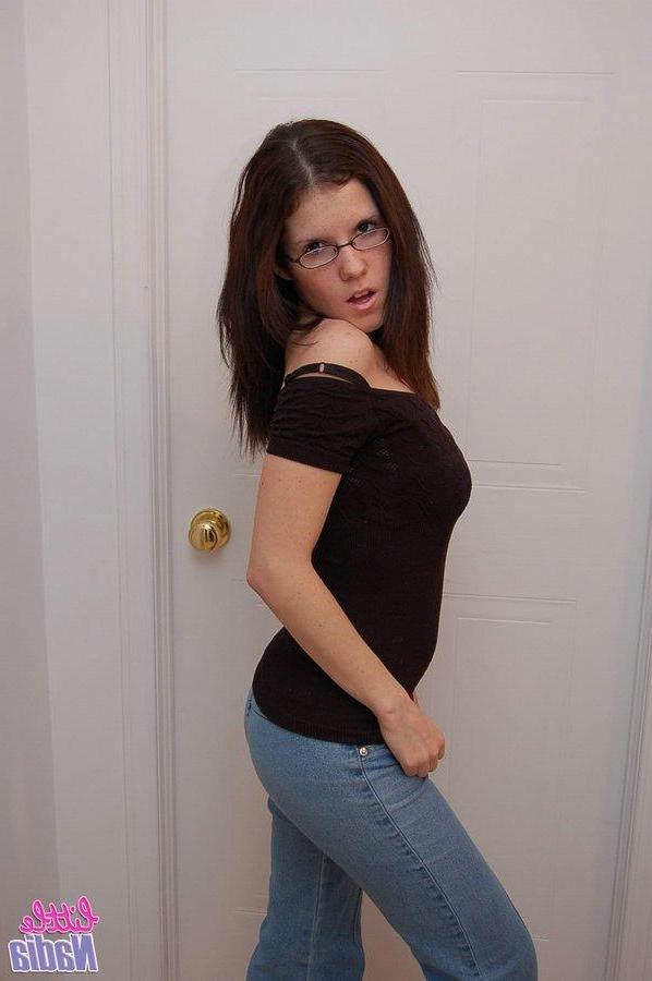15P Pictures of teen hottie Little Nadia stripping down to her panties