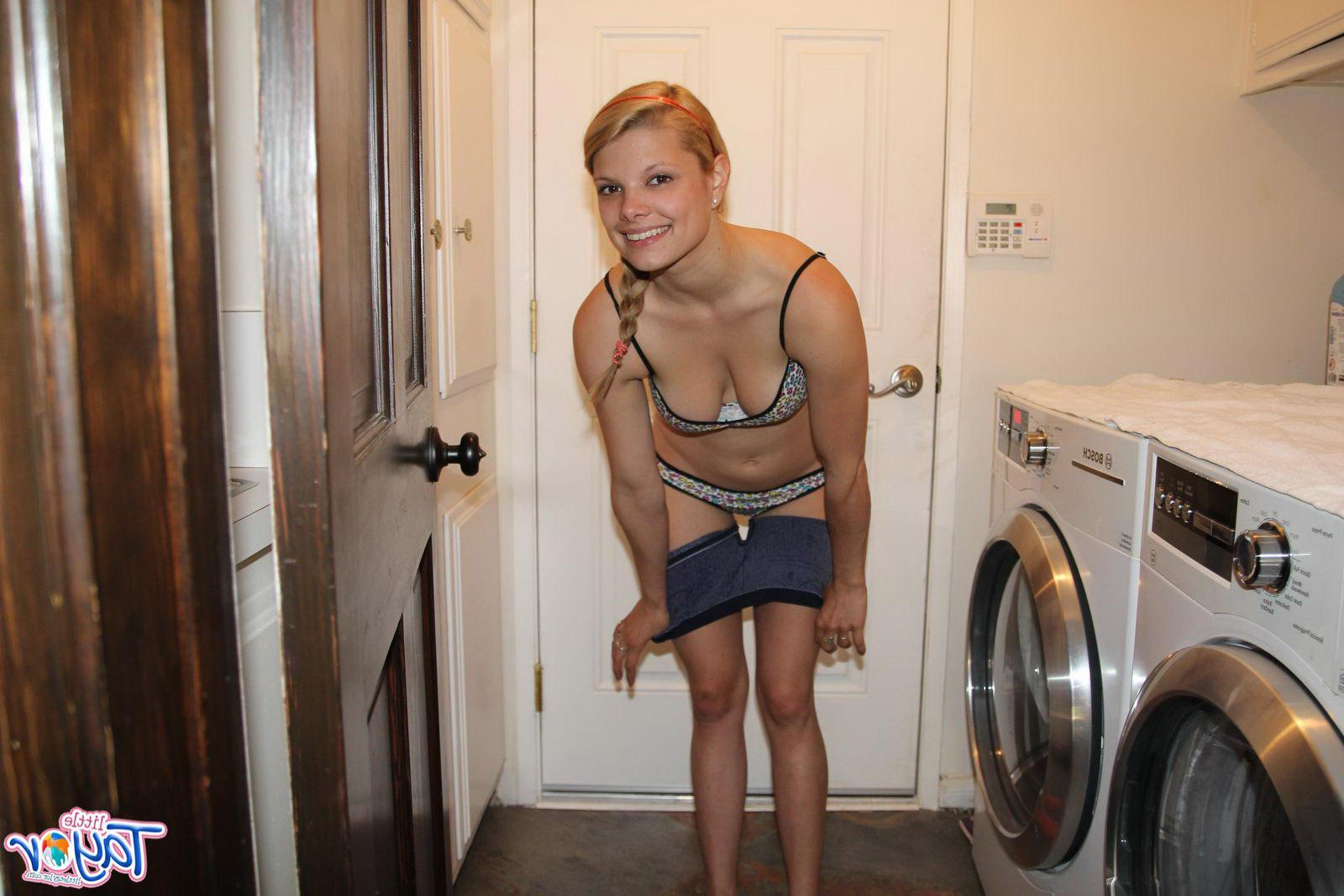 12P Pictures of blonde teen Little Taylor taking her clothes off to wash them