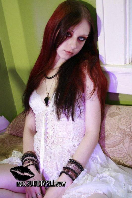 19P Pictures of Liz Vicious taking off her white dress