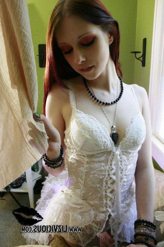 19P Pictures of Liz Vicious taking off her white dress