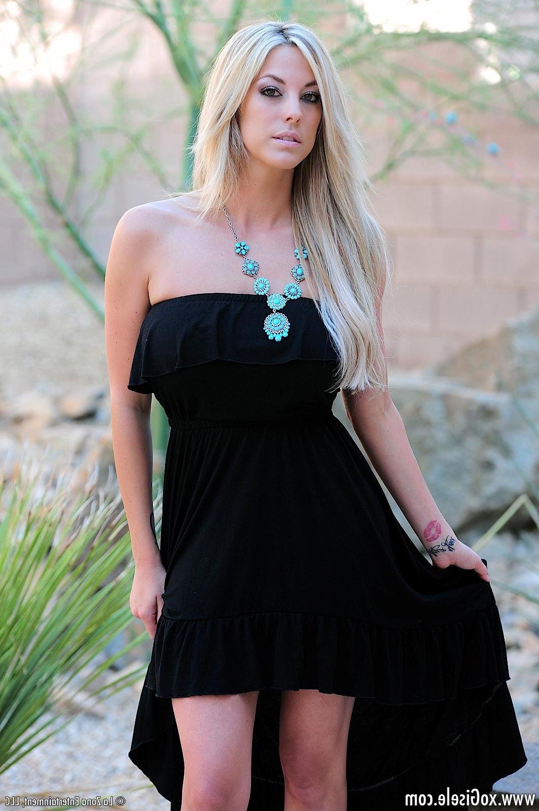 15P Gisele wears a long black dress that allows easy access to slip of her panties and touch herself