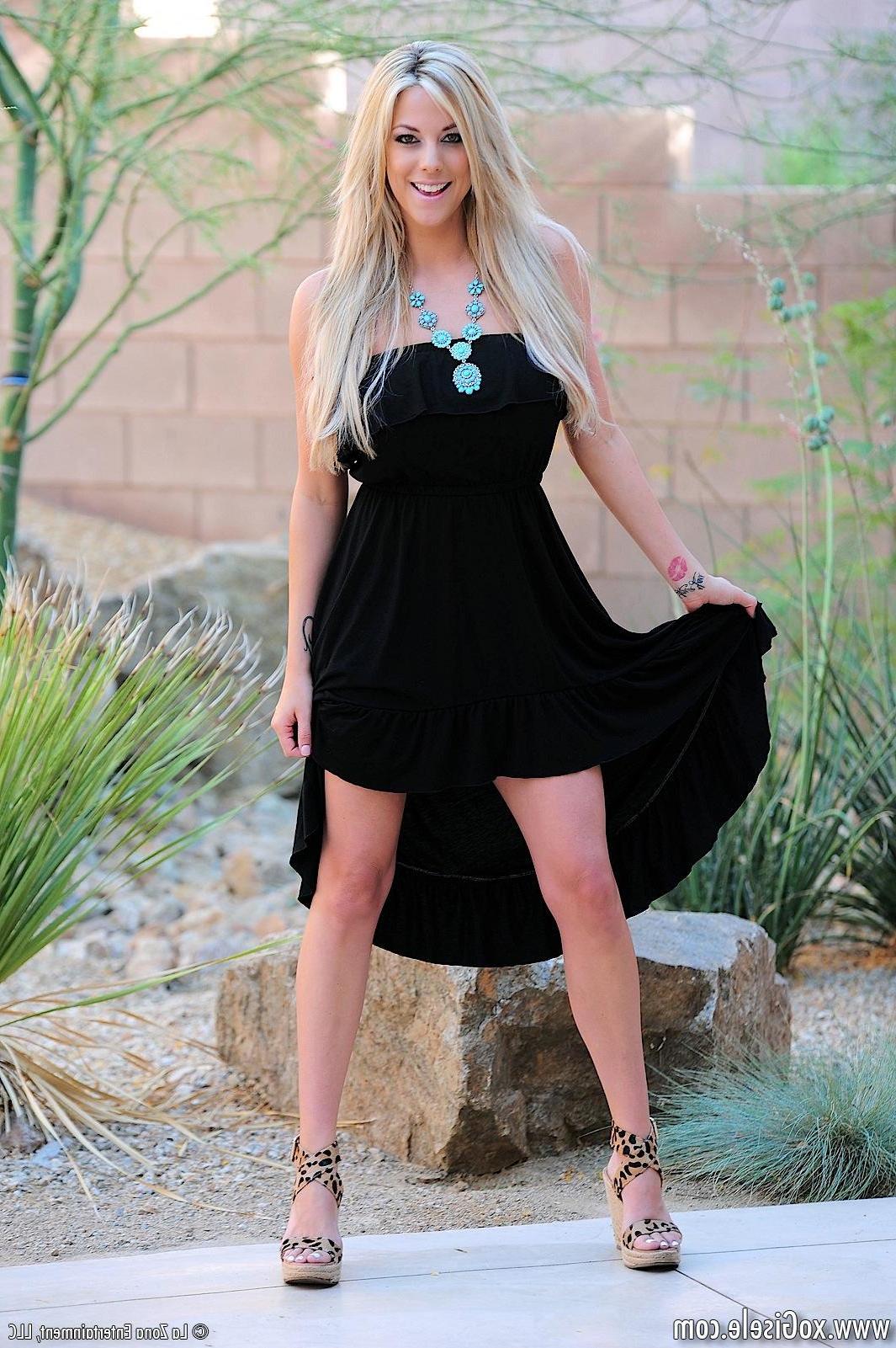 15P Gisele wears a long black dress that allows easy access to slip of her panties and touch herself
