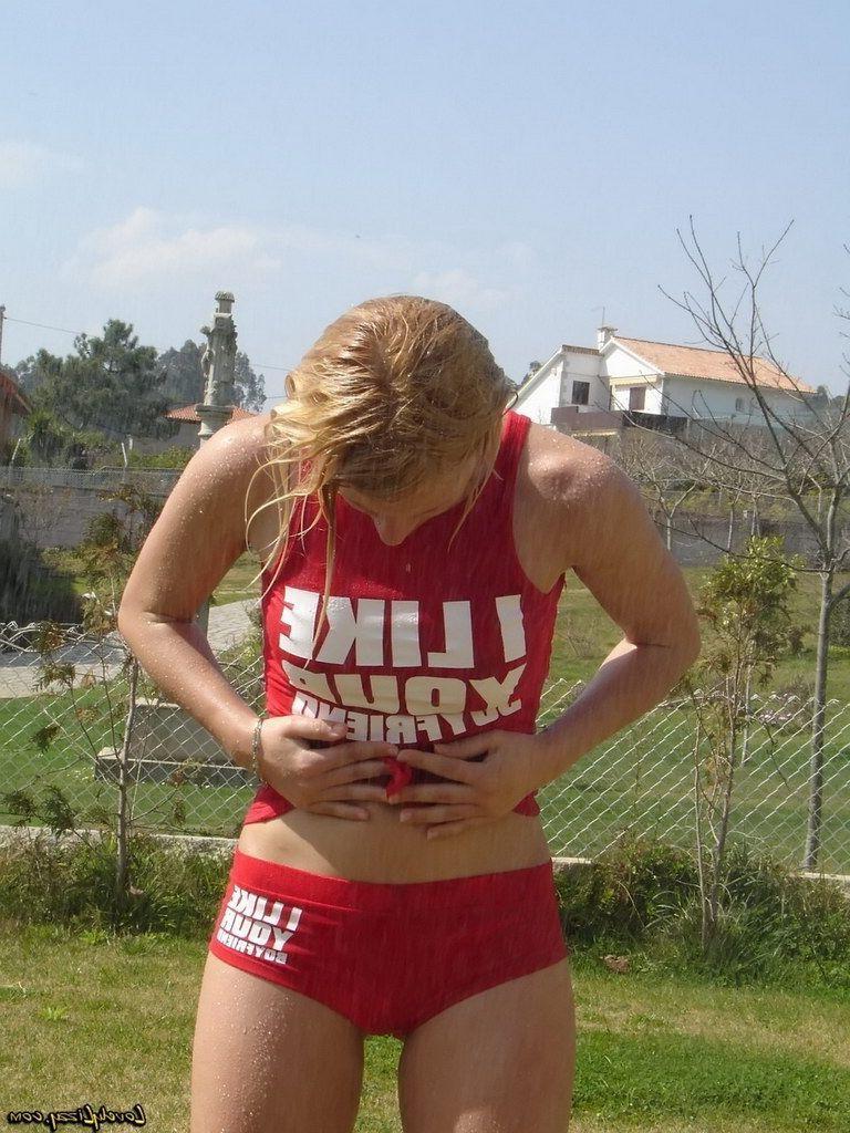 20P Pictures of teen cutie Lovely Lizzy showing off her hot fuckable body outside
