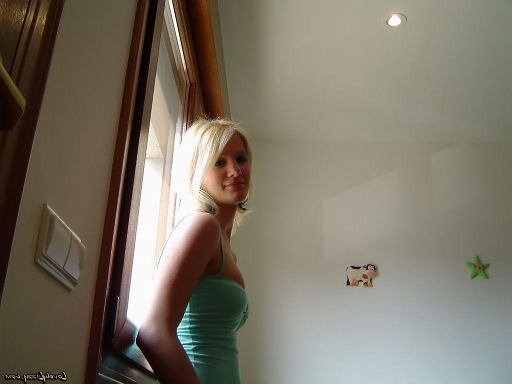 20P Pictures of teen Lovely Lizzy teasing in a sexy dress