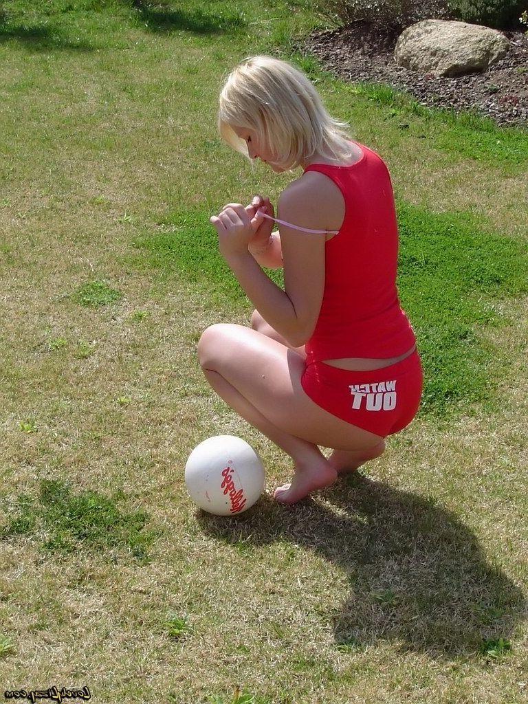 19P Pictures of teen girl Lovely Lizzy playing some naughty soccer