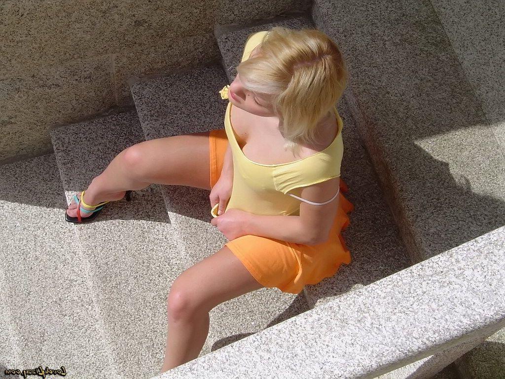 20P Pictures of Lovely Lizzy showing her sexy ass outside
