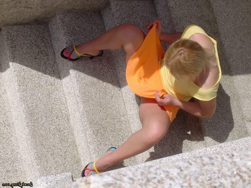20P Pictures of Lovely Lizzy showing her sexy ass outside