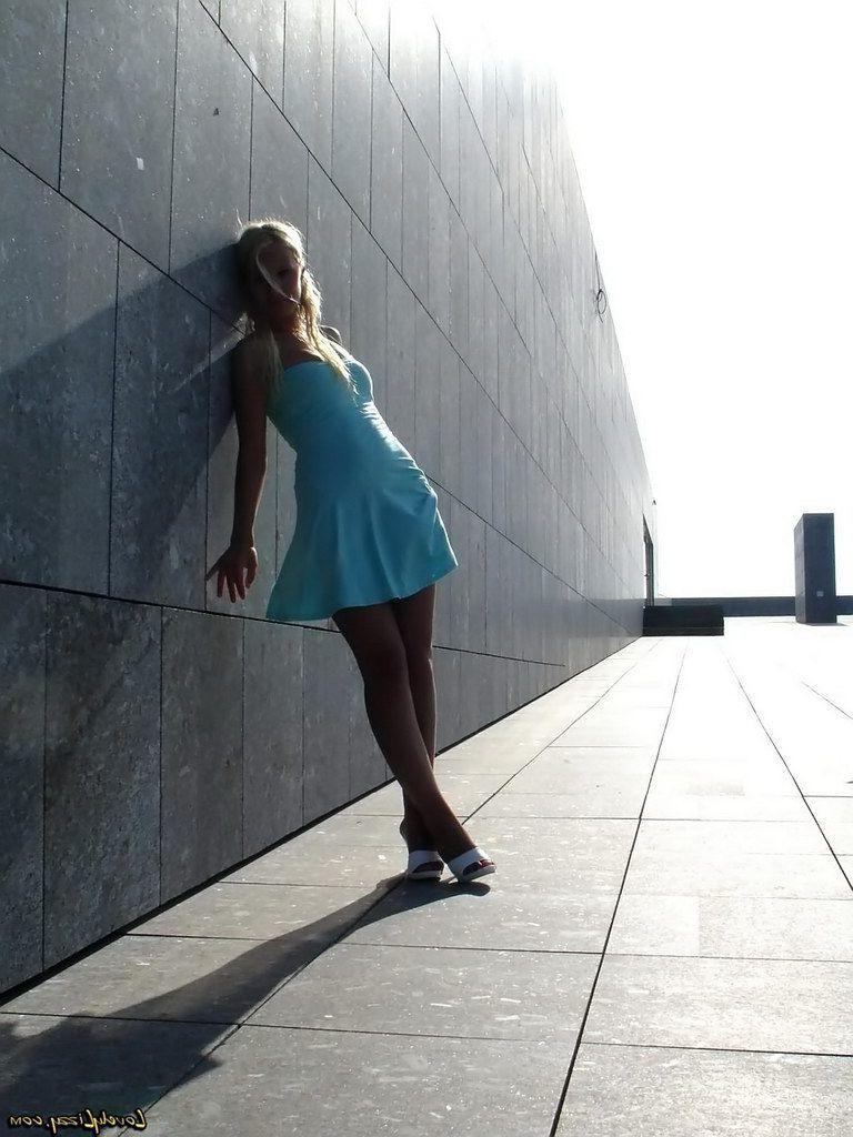 20P Pictures of Lovely Lizzy showing her sexy ass
