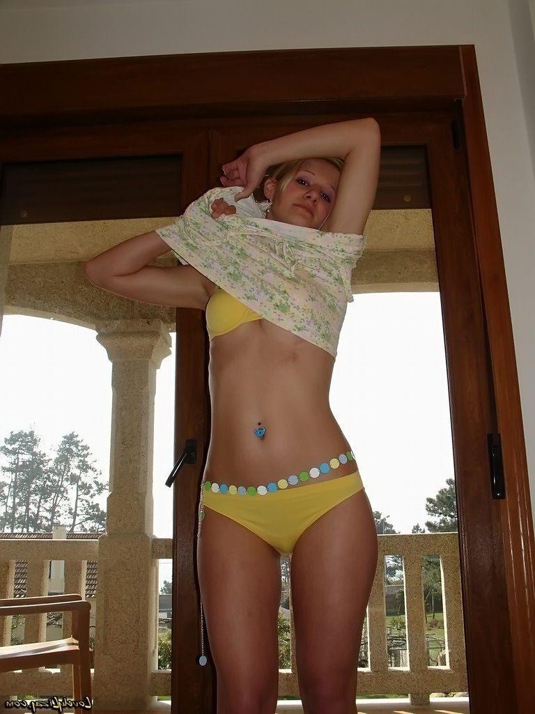 20P Pictures of teen girl Lovely Lizzy showing off her sexy body