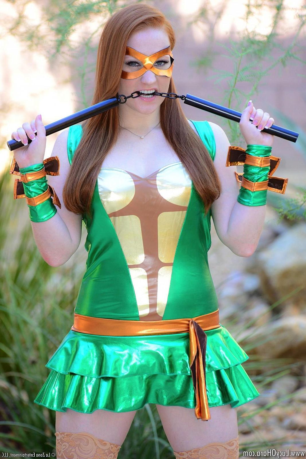 15P Lucy Ohara dresses up in a ninja turtle cosplay outfit and gets down and dirty with her nunchucks