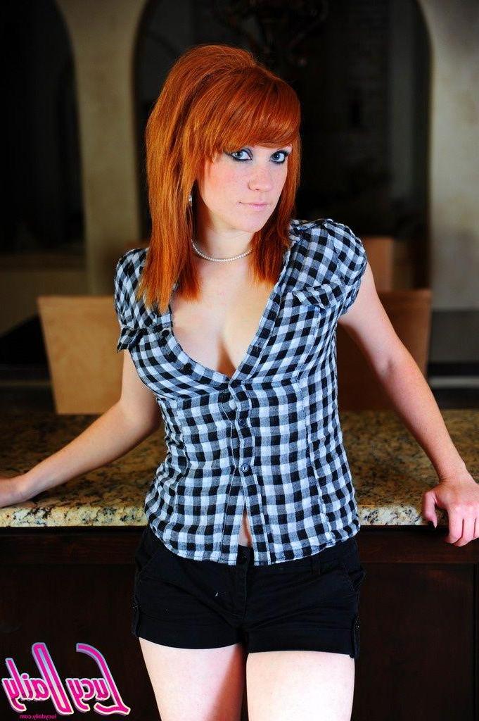 20P Pictures of Lucy Daily stripping out of her sexy plaid shirt