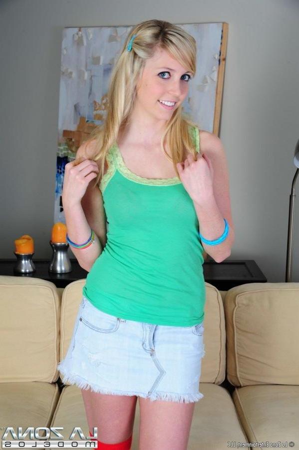 15P Madison looks cute as she plays with her body wearing nothing but high socks