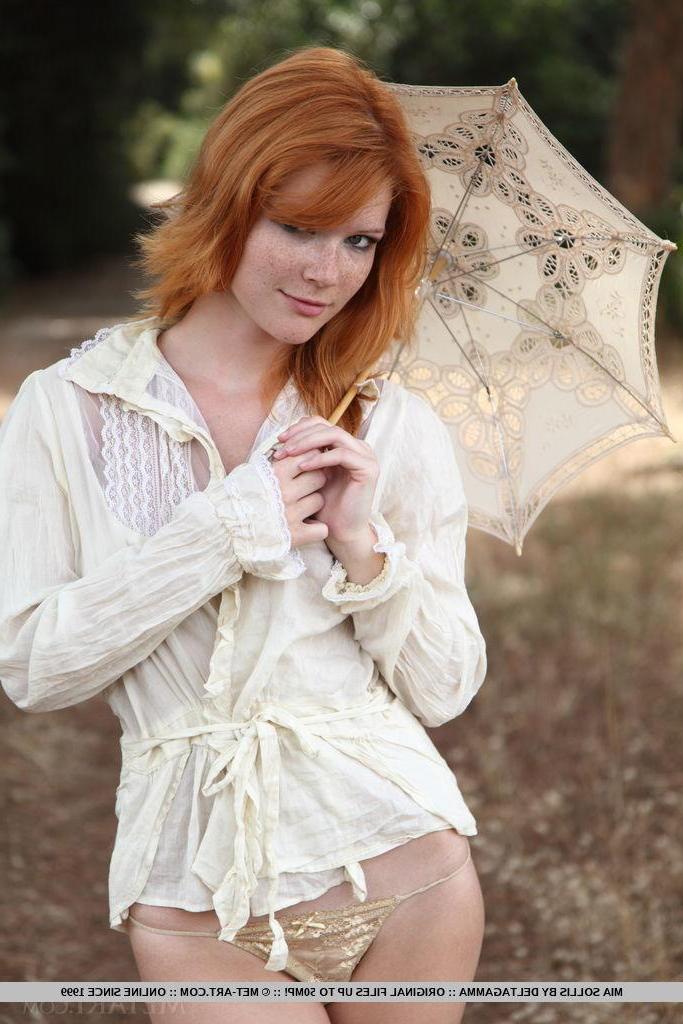 18P Redhead teen Mia Sollis gets naked for you outside in "Folme"