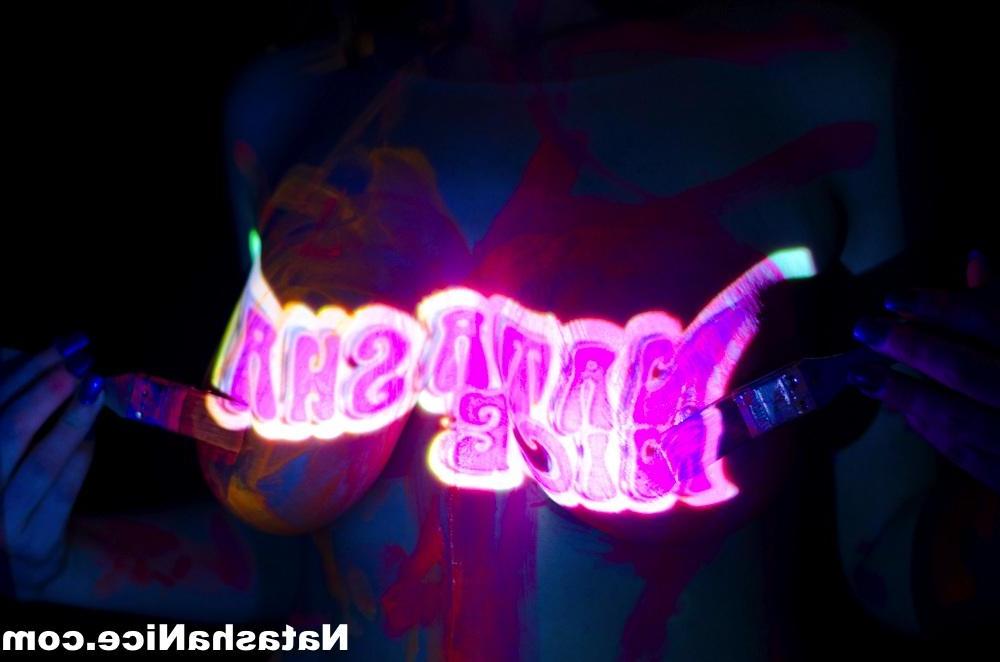 16P Busty Natasha Shoots A Fun And Sexy Black Light Promo For Her DVD