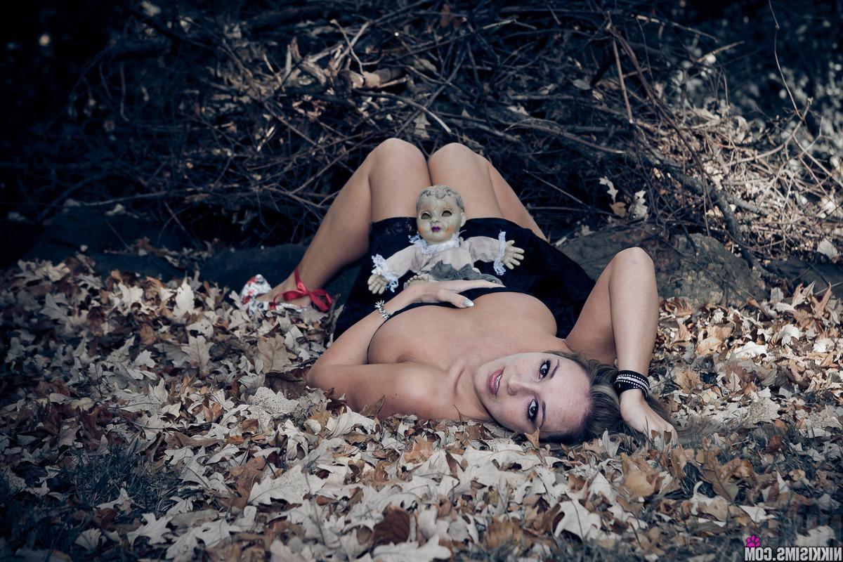 15P Busty hottie Nikki Sims wishes you a Happy Halloween outside