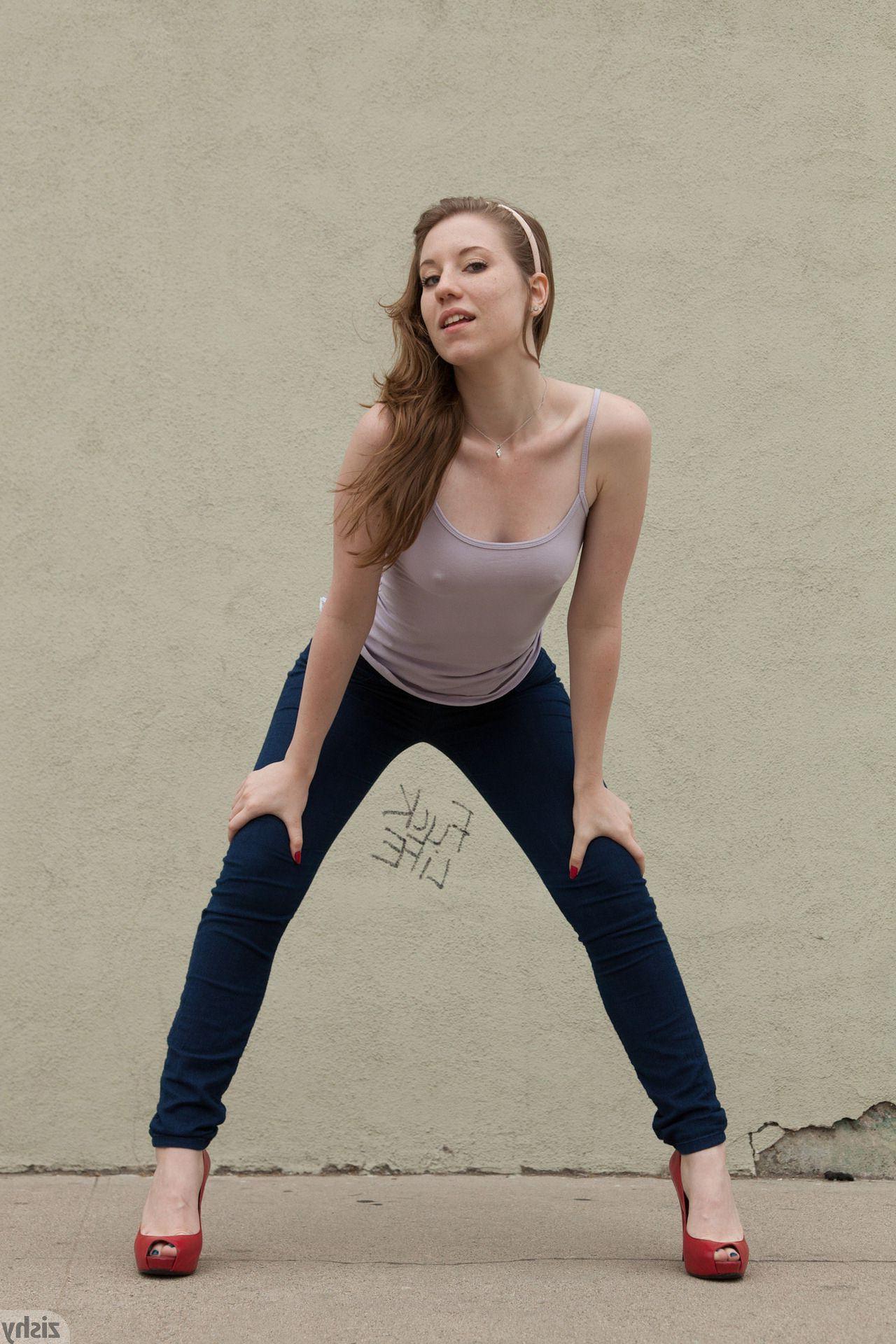 12P Redhead hottie Olivia Pelton teases in a sexy pair of jeans
